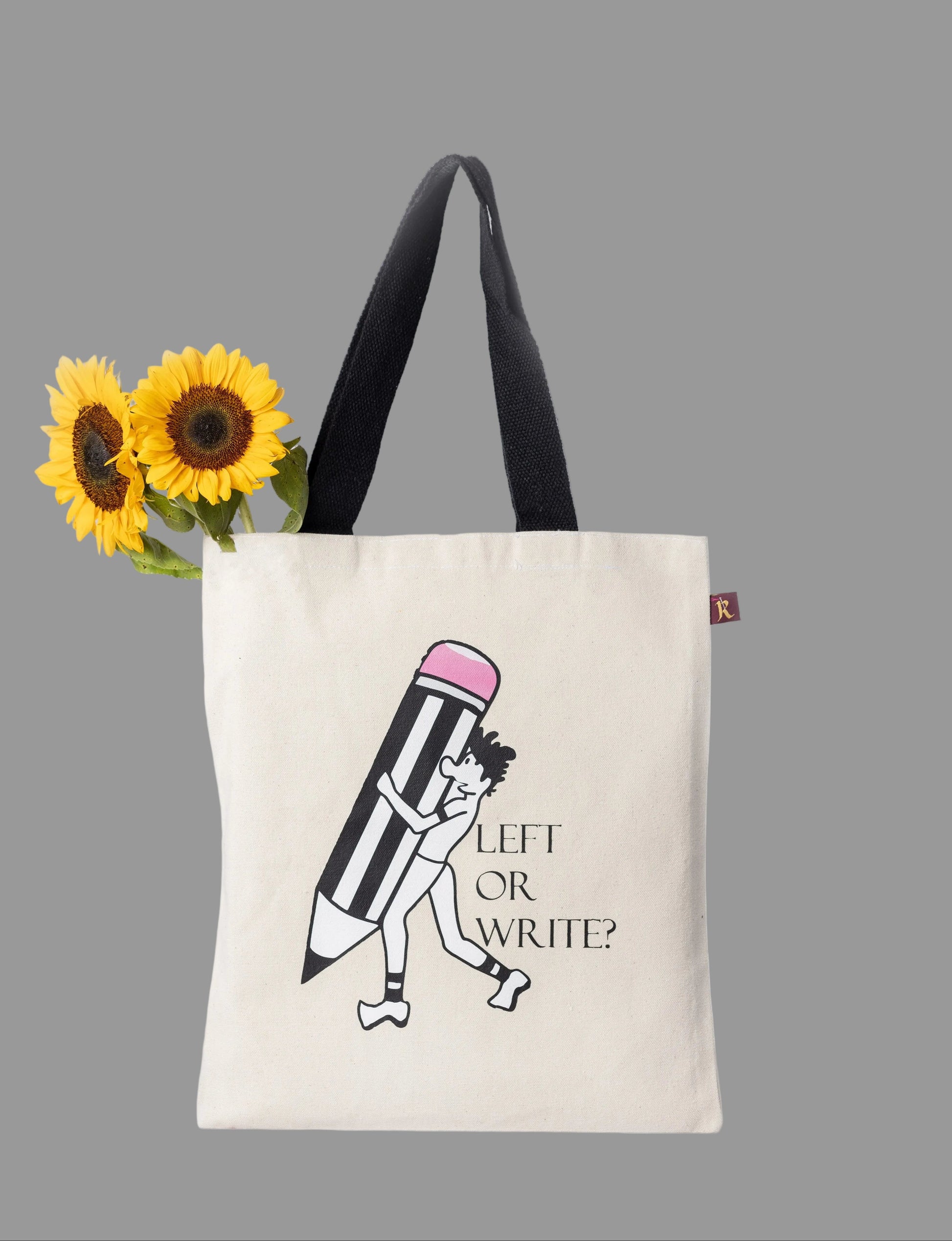 Tote bag with a design of a pencil and text on a light background